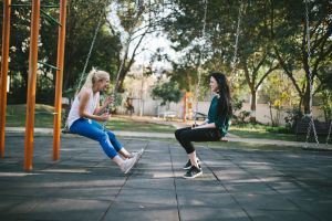 A couple on swings 