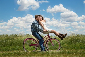 romantic couple on bike at therapy